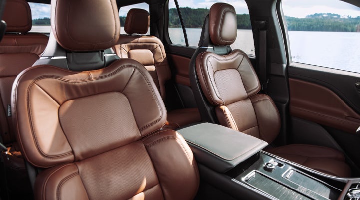 The front row's Perfect Position Seats in a 2024 Lincoln Aviator® Reserve model with Ebony Roast interior | Hooks Lincoln in Fort Worth TX
