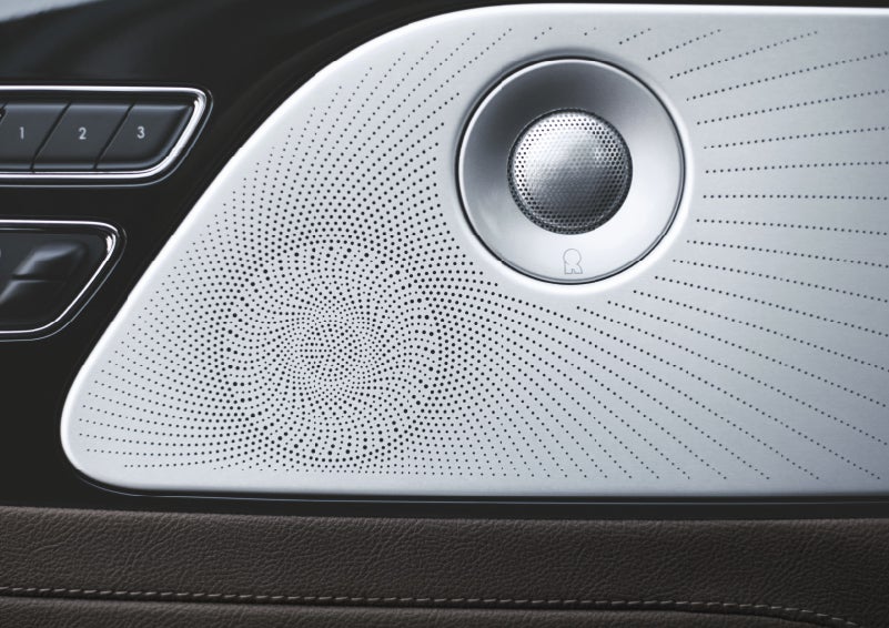 Two speakers of the available audio system are shown in a 2024 Lincoln Aviator® SUV | Hooks Lincoln in Fort Worth TX